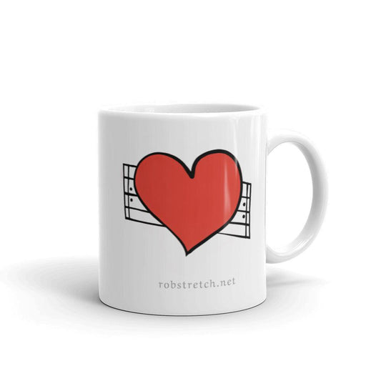 Love Repeat mug featuring a bold red heart design for coffee lovers and art enthusiasts
